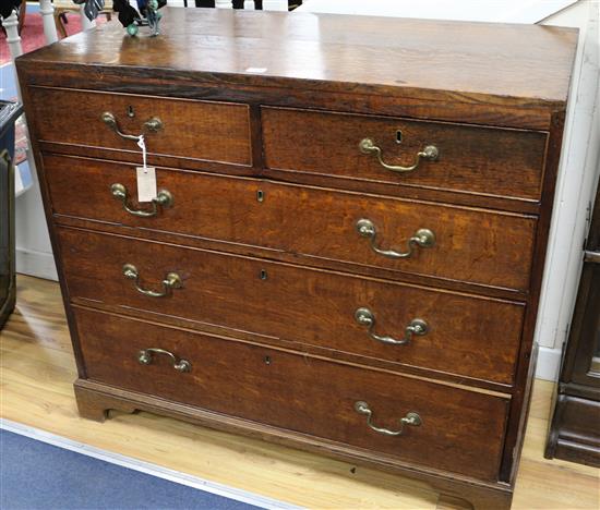 A George III oak chest of drawers, W.102cm